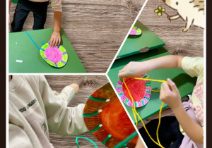 dzieci wykonują pracę plastyczną