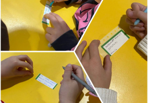 dzieci wykonują zadania w ramach pracy z bajką terapeutyczną