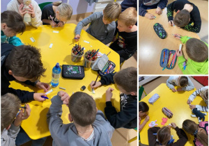 dzieci wykonują zadania w ramach pracy z bajką terapeutyczną