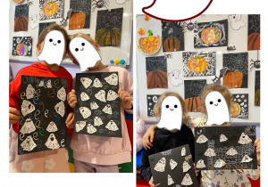 Uczniowie prezentujący wykonaną pracę plastyczną