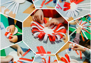 dzieci wykonują pracę plastyczną - kwiat w barwach narodowych