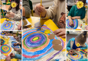 dzieci wykonują pracę plastyczną