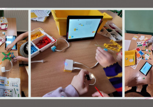 Dzieci w małych zespołach budujące z klocków Lego.